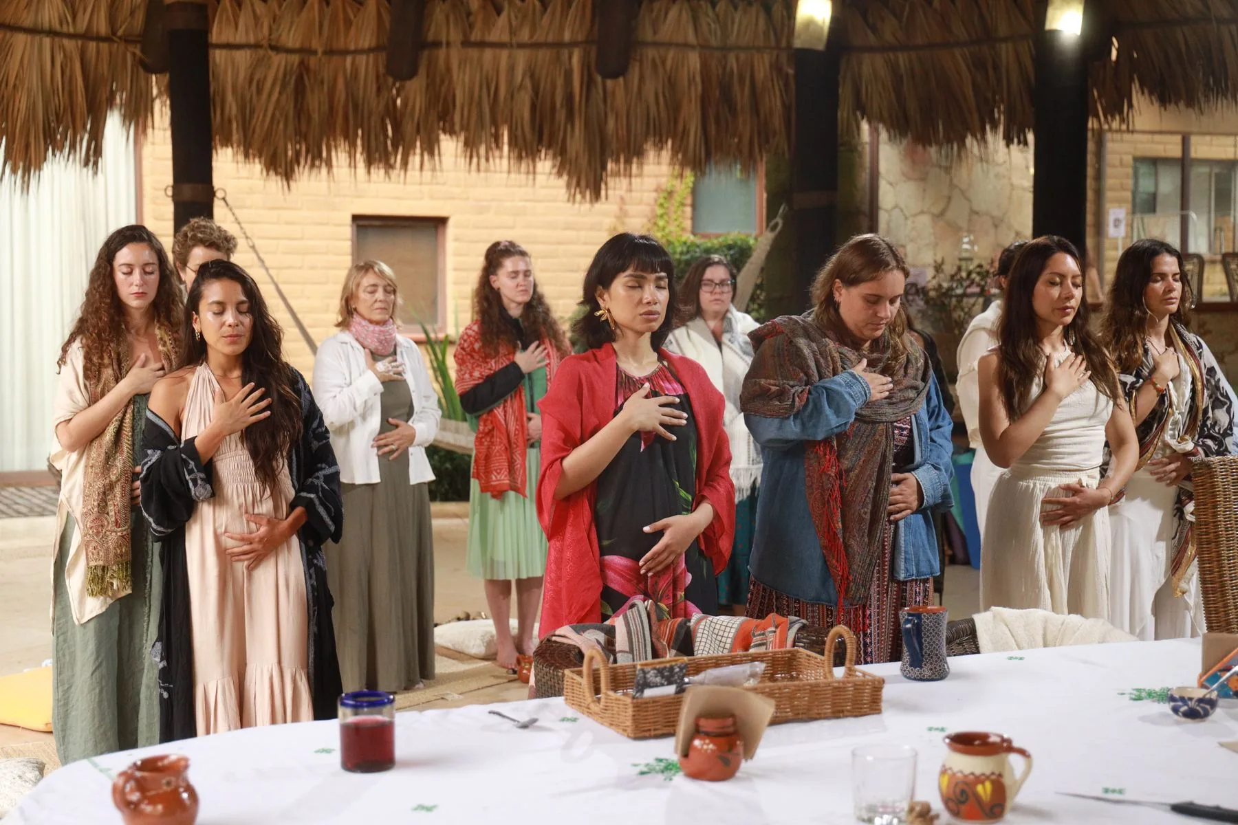 Paola Ucelo guiding a group gathering in ceremony